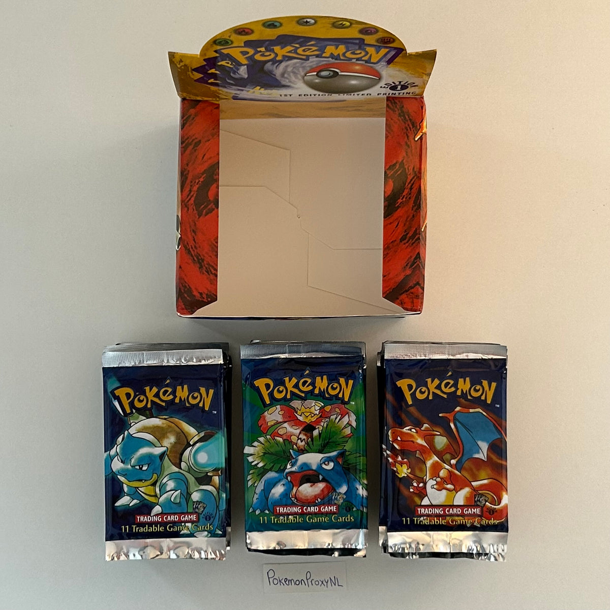 Booster box/packs: Base Set (first edition) (BS) / PROXY Pokémon TCG card(s)