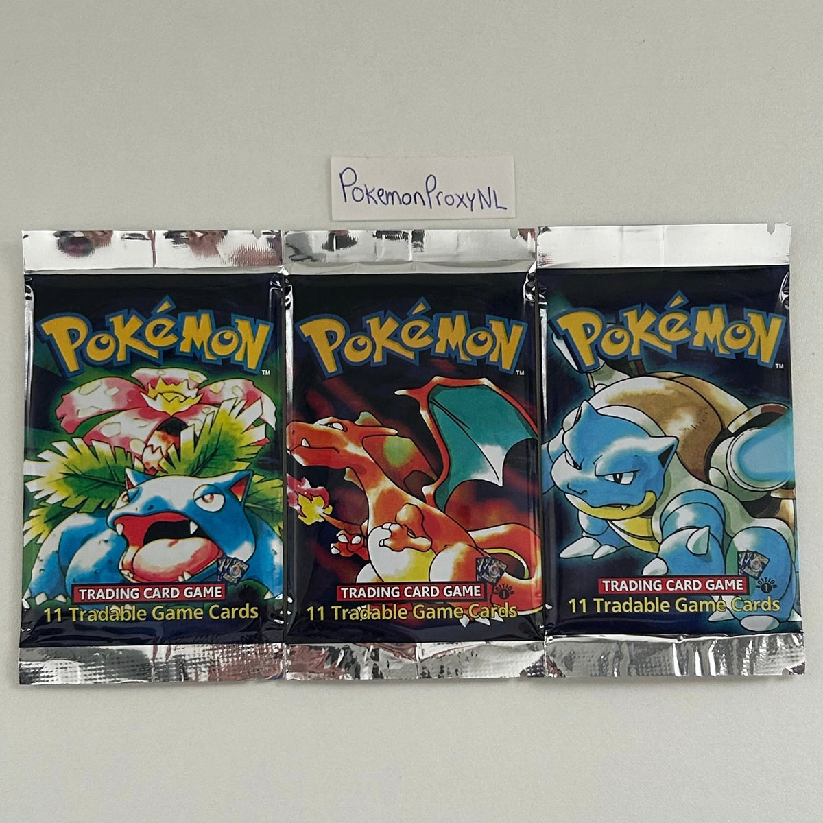 Booster box/packs: Base Set (first edition) (BS) / PROXY Pokémon TCG card(s)