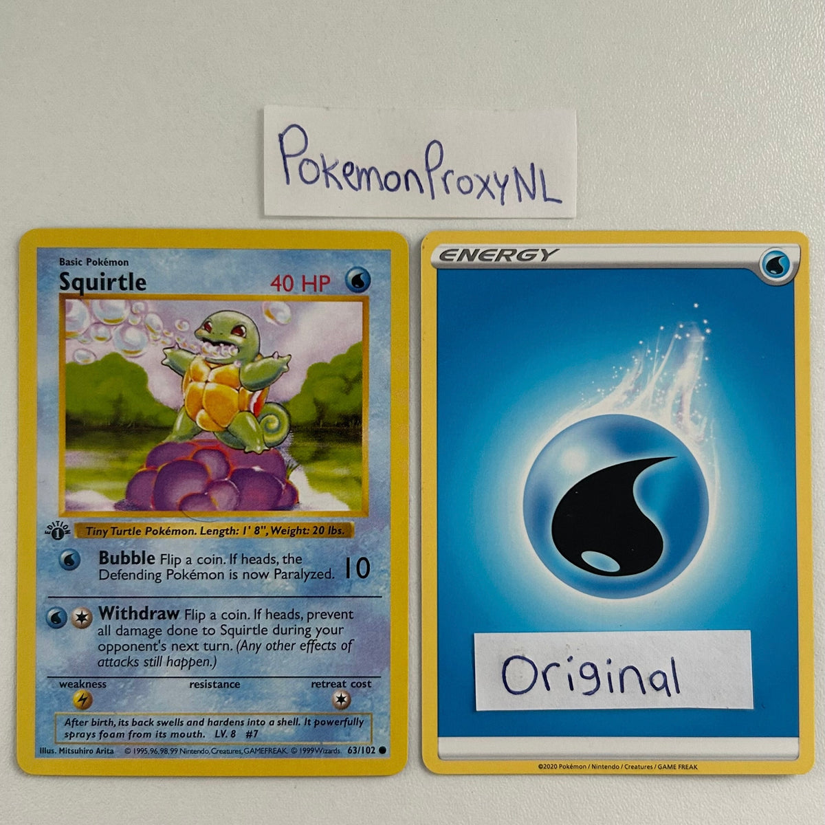 Booster box/packs: Base Set (first edition) (BS) / PROXY Pokémon TCG card(s)
