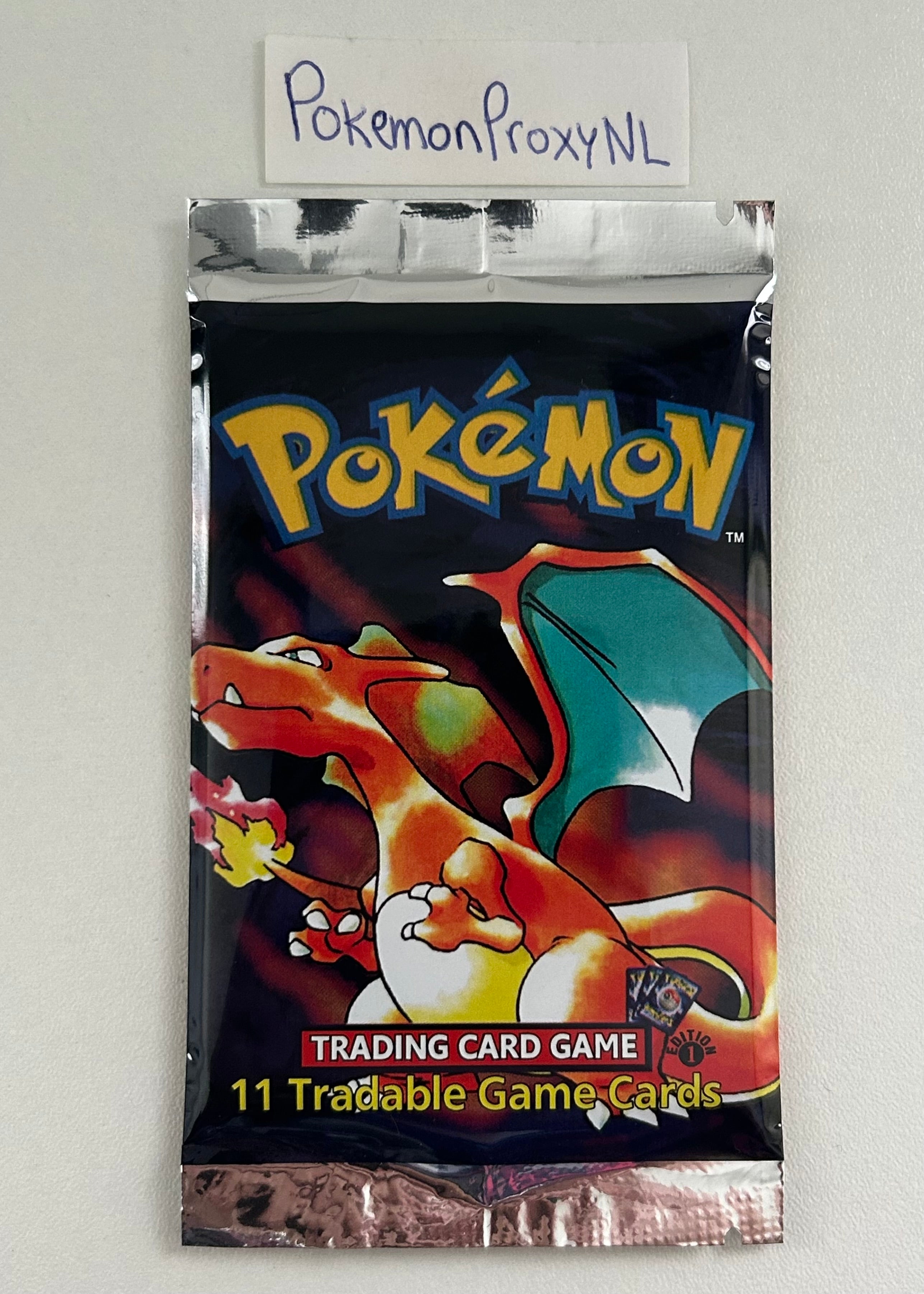 Base Set (First Edition) Booster with 11 cards / Base Set / 1999 / PROXY Pokémon TCG card(s)