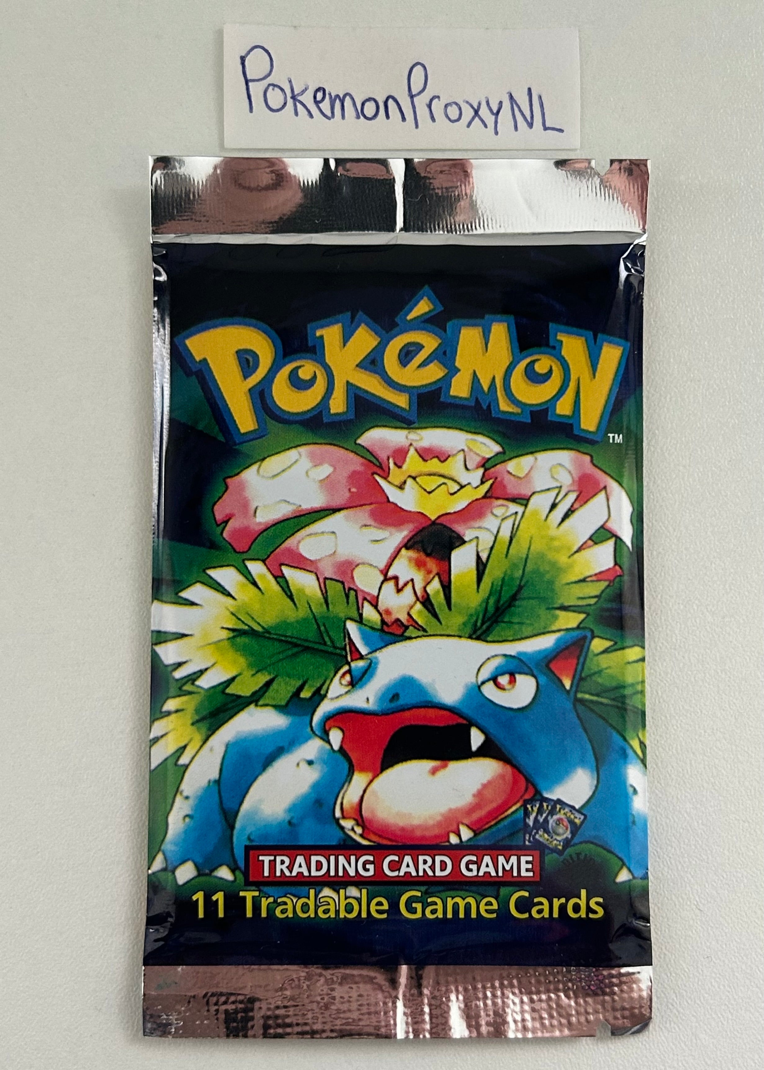 Base Set (First Edition) Booster with 11 cards / Base Set / 1999 / PROXY Pokémon TCG card(s)