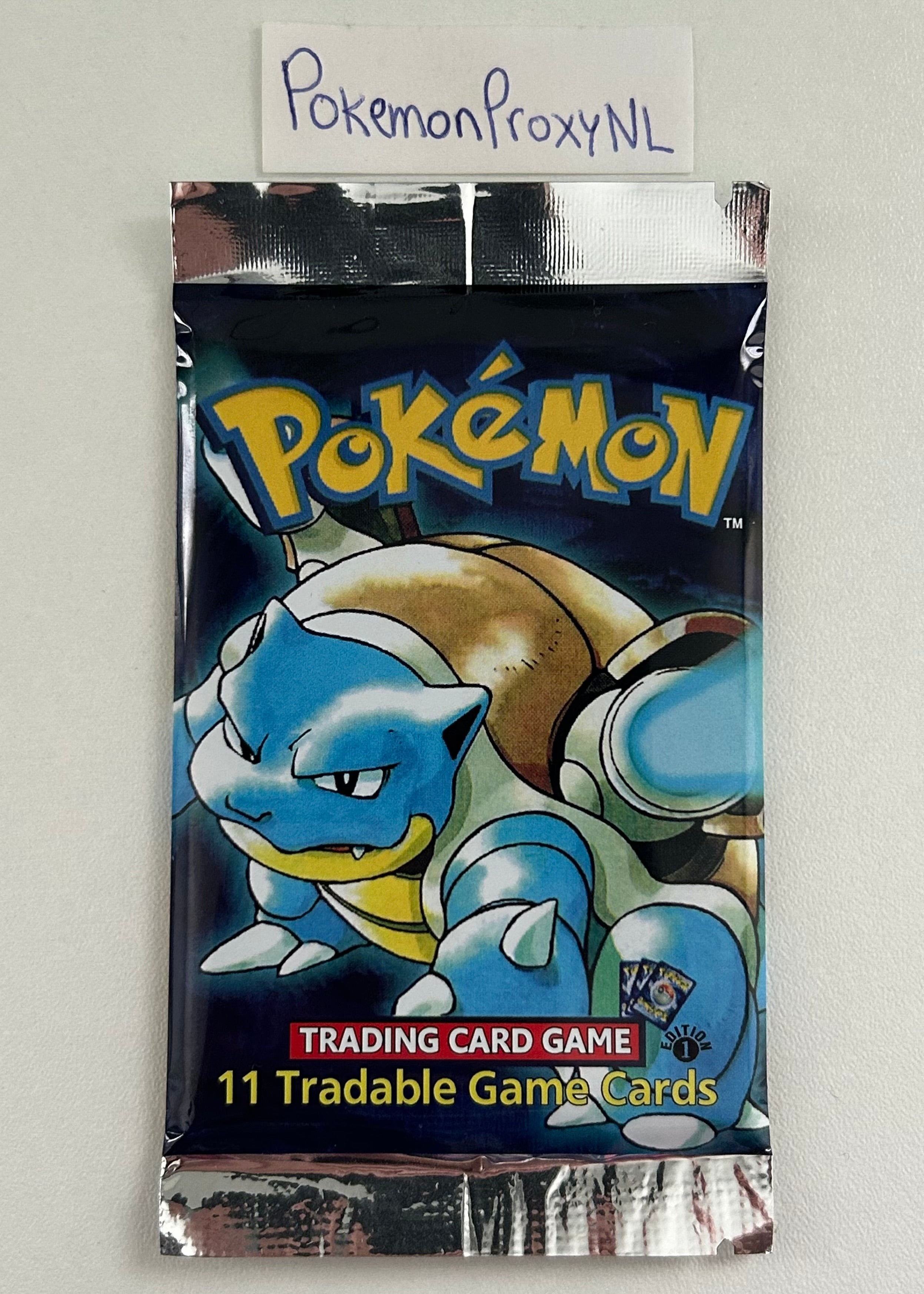 Base Set (First Edition) Booster with 11 cards / Base Set / 1999 / PROXY Pokémon TCG card(s)